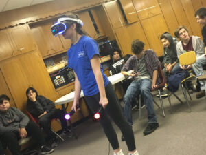 Students in VR exploring VR standing up.